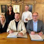 vertragsunterzeichnung modehaus hoffmeyer